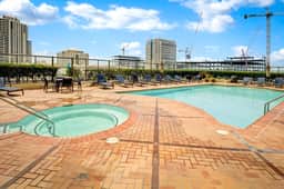 Upscale 2BR Condo with Bay Views, Pool, & Rooftop Deck